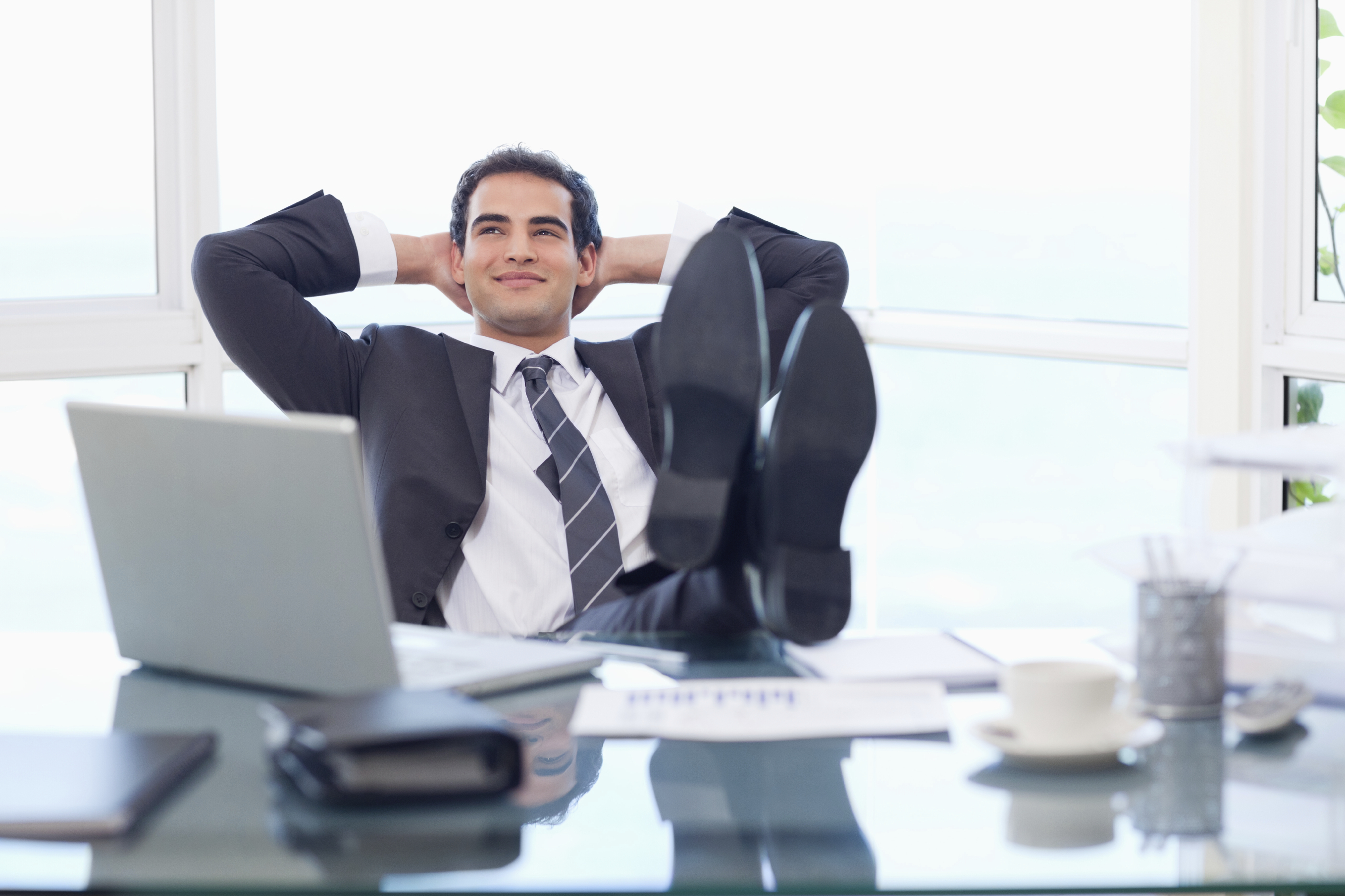 Smiling businessman relaxing