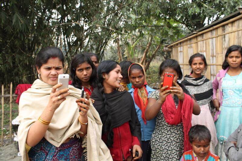 Illustration 9: Girls in rural Bihar taking photos of our team.